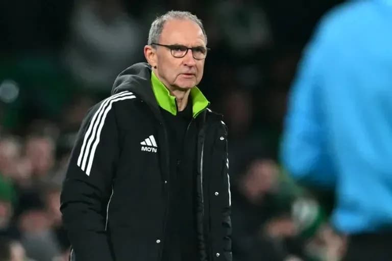 Manager observing the game from the sidelines