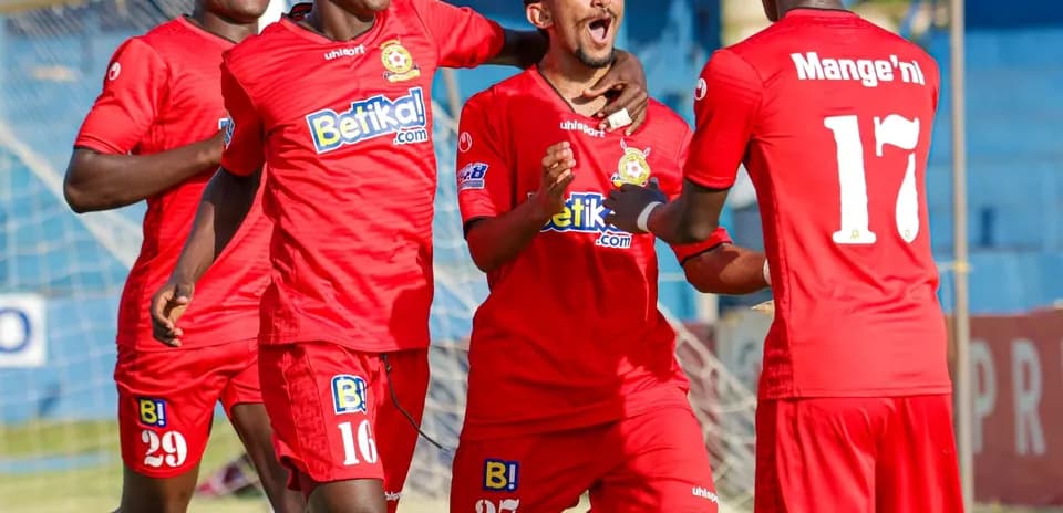 Players celebrating a goal during FKF Premier League match