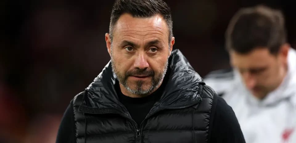 Football manager on the sidelines during match