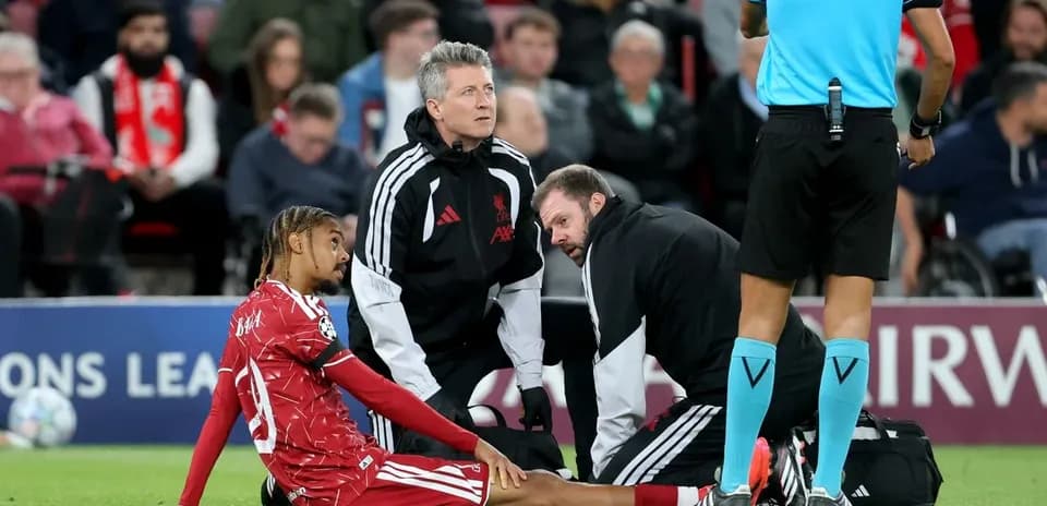 Player receiving medical attention on the field
