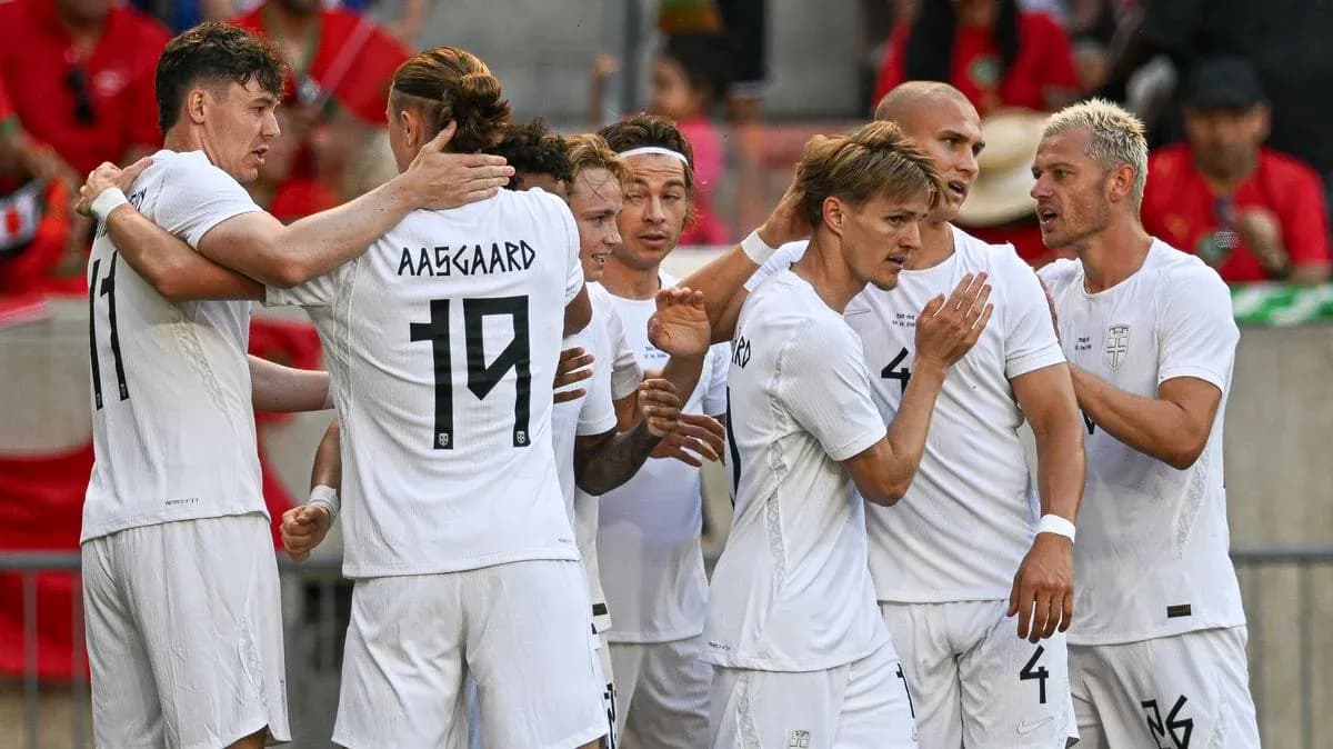 Players celebrating after a goal during match