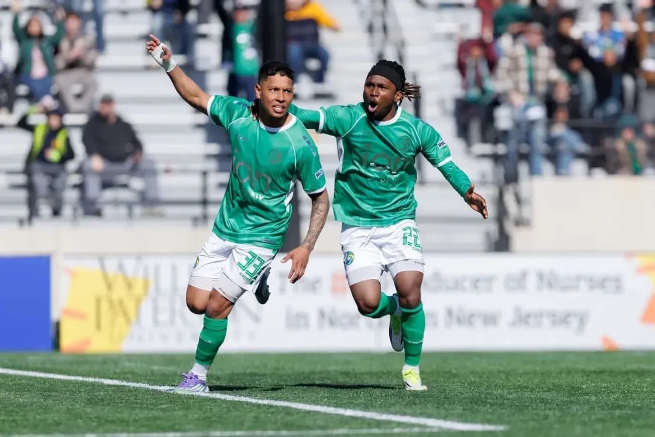 Players celebrating after scoring a goal