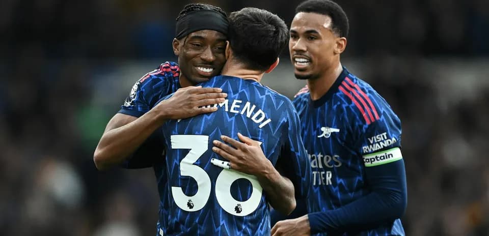 Arsenal players celebrating a goal together
