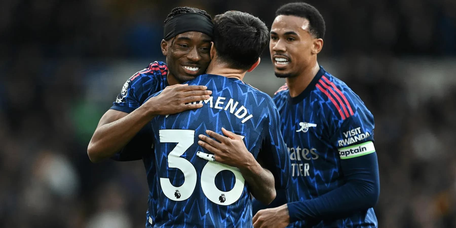Arsenal players celebrating a goal together