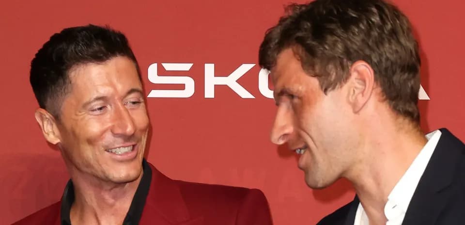 Two players interacting at an awards ceremony