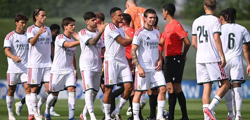 Real Madrid players greeting referee before match