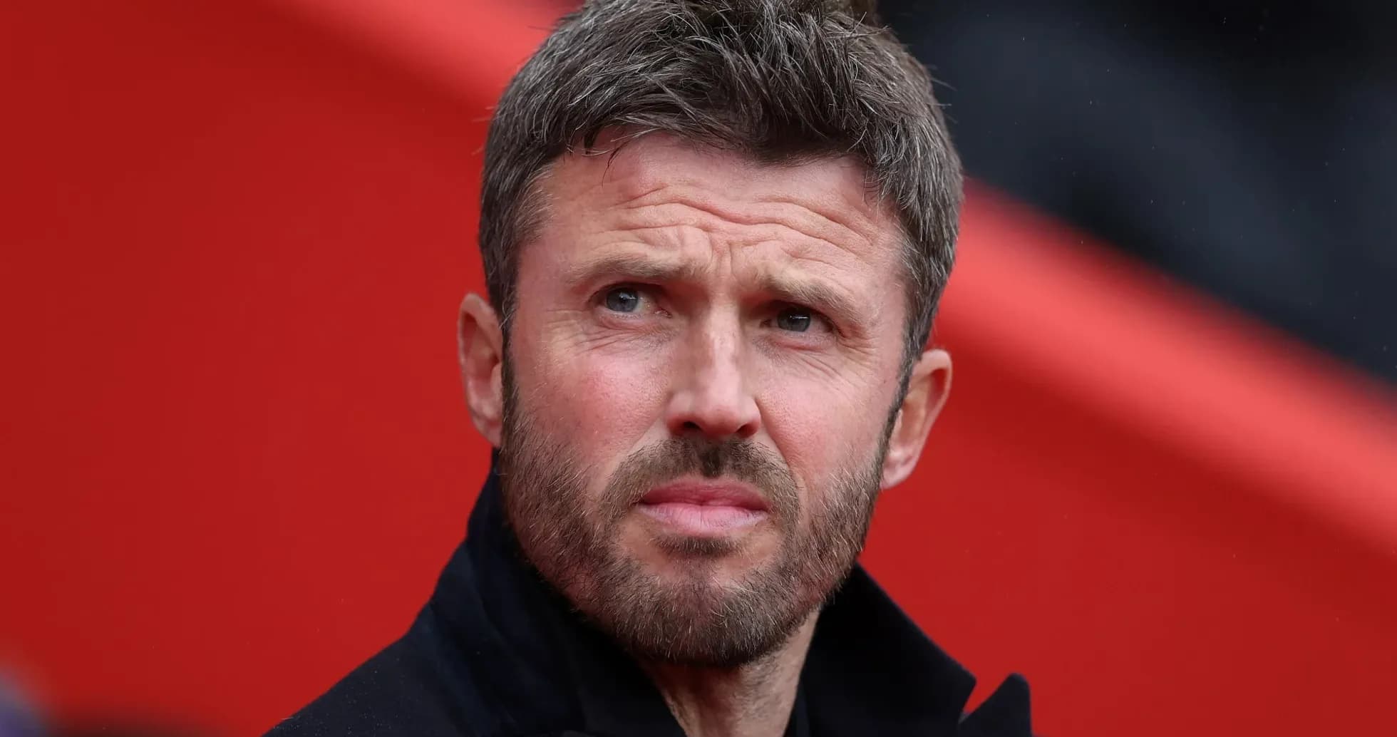 Man observing match from the sidelines