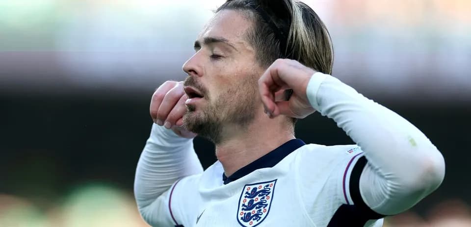 Player with England jersey during match action