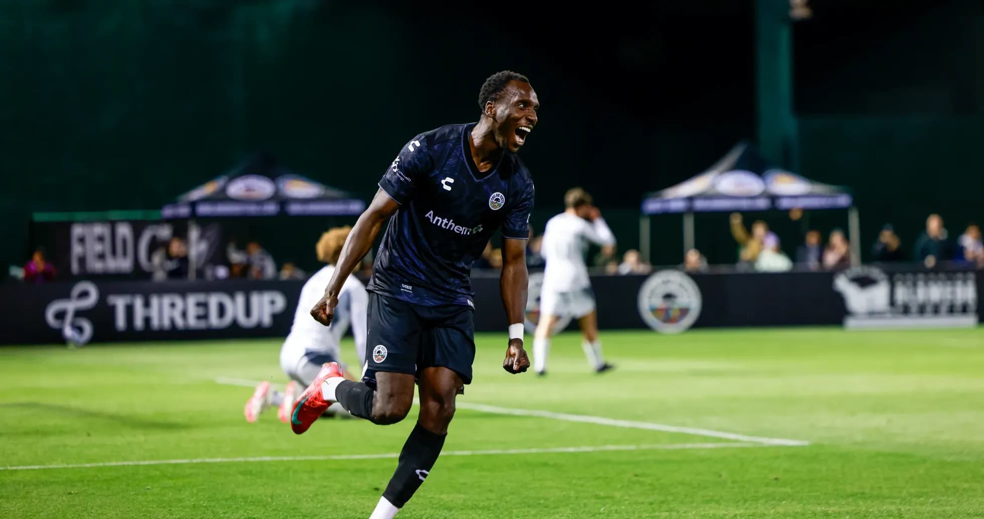 Player celebrating goal during USL League One match
