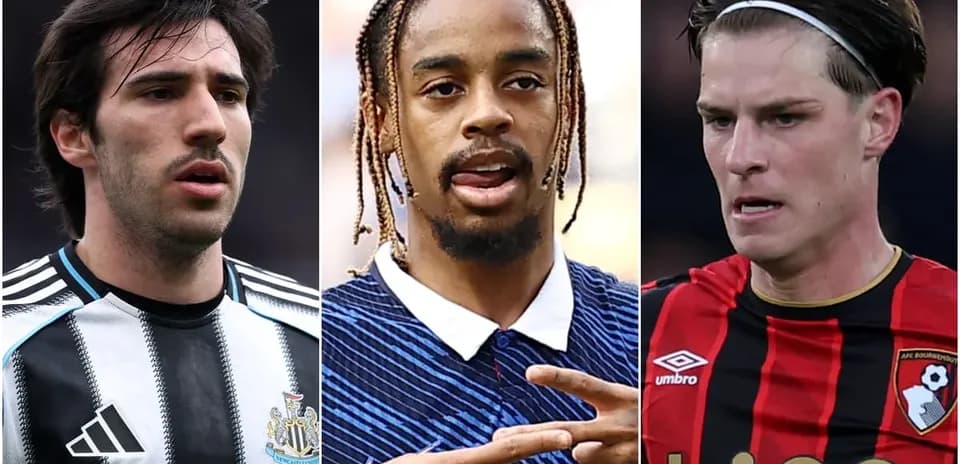 Three football players in club jerseys looking forward