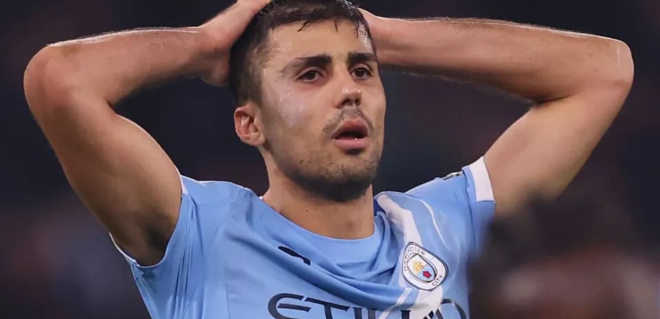 Player holding head in disappointment during match