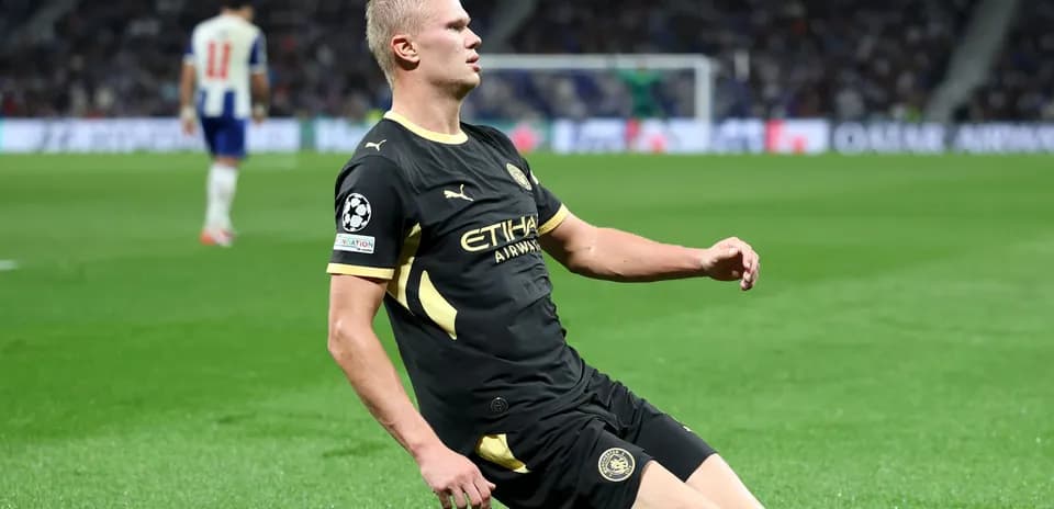Player on knees celebrating during a match