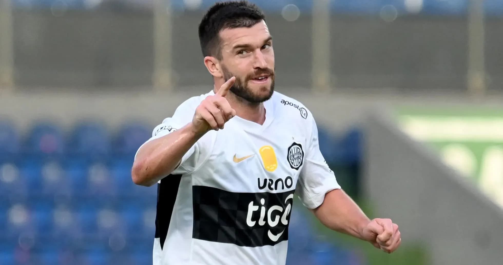 Player celebrating with finger raised during match