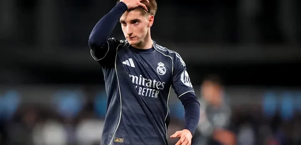 Real Madrid player looking concerned on the pitch