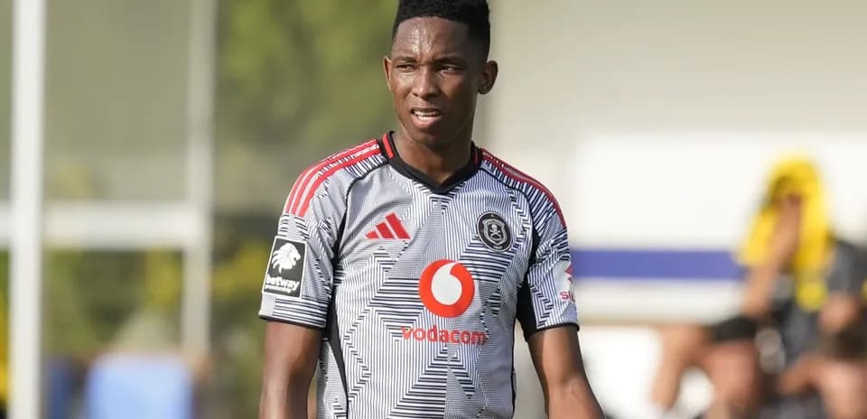 Player in grey uniform during training session