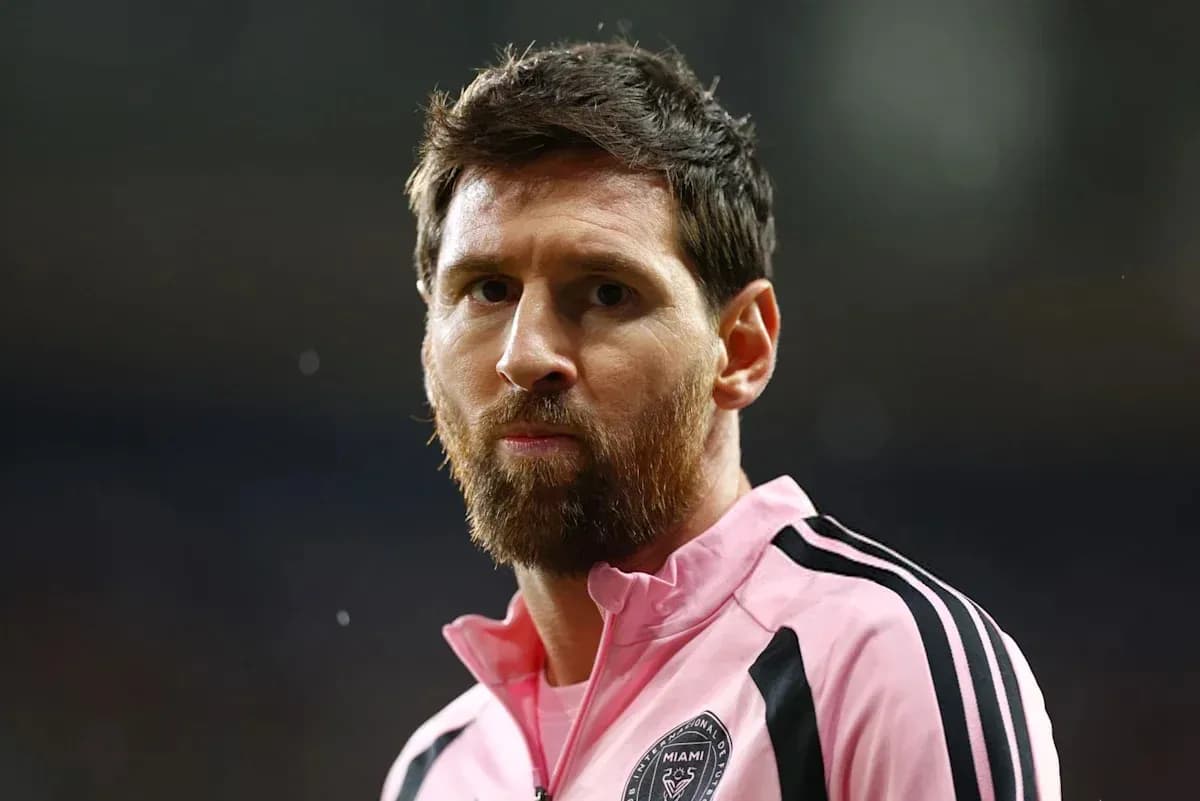 Player in pink jersey during match warm-up