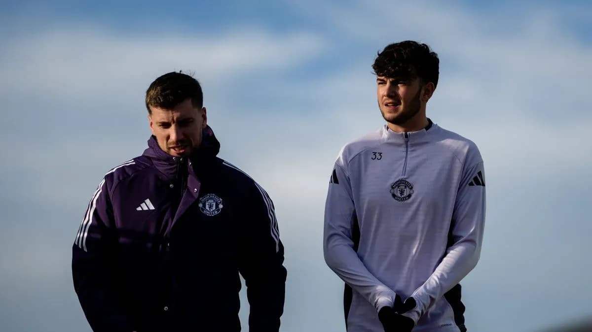 Two Manchester United players walking during training session