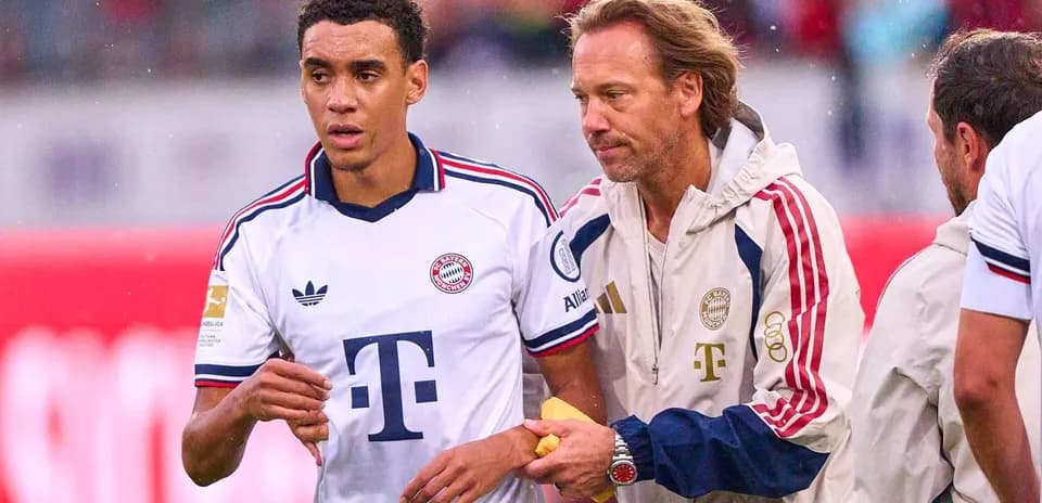 Player being attended to by staff during match