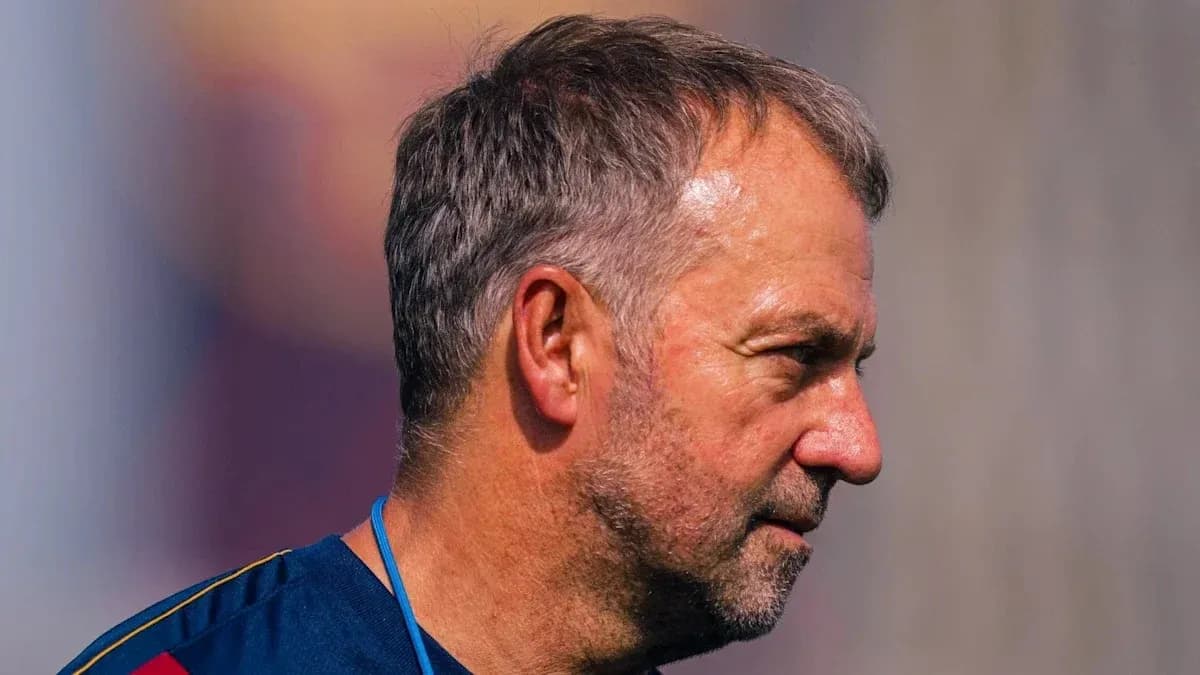 Coach observing during training session on field