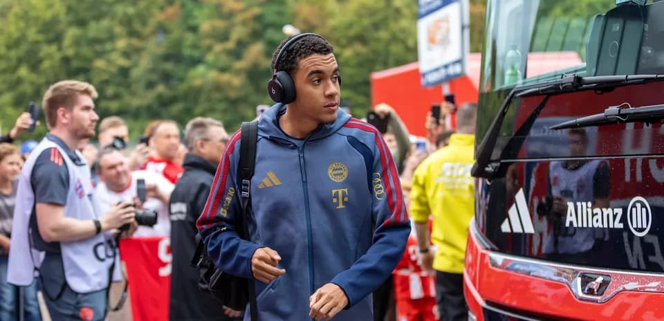 Bayern Munich player arriving at team bus