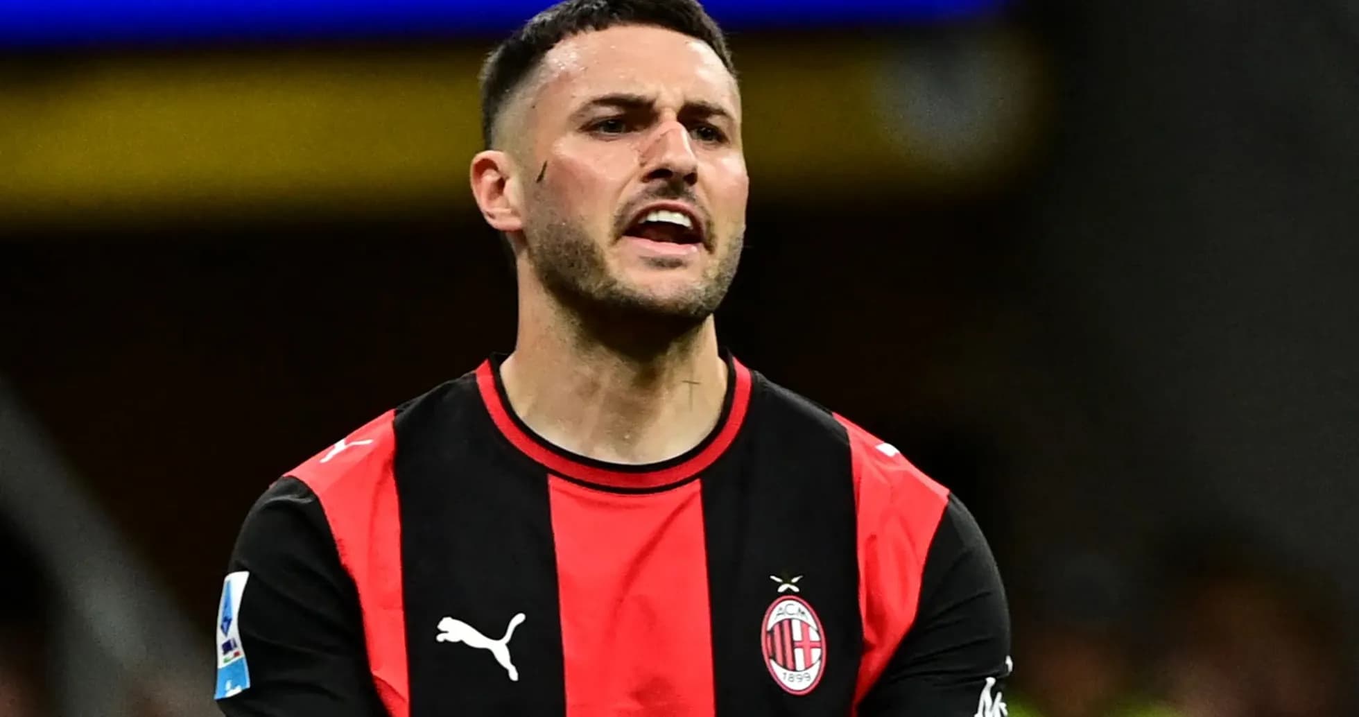 Goalkeeper in AC Milan jersey during match