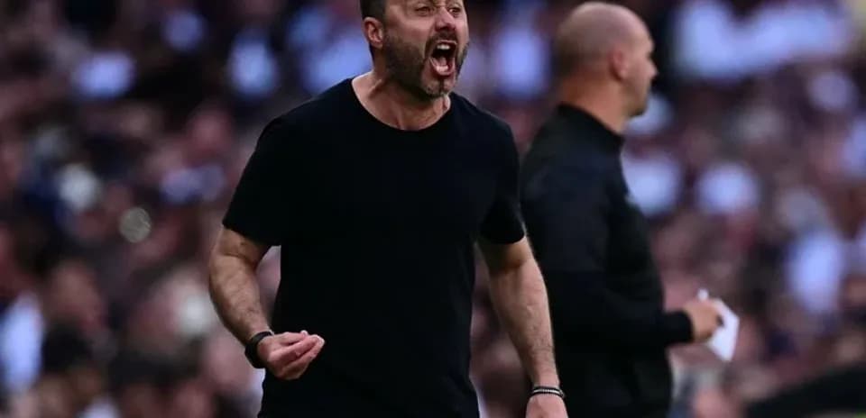Coach shouting on the sidelines during match