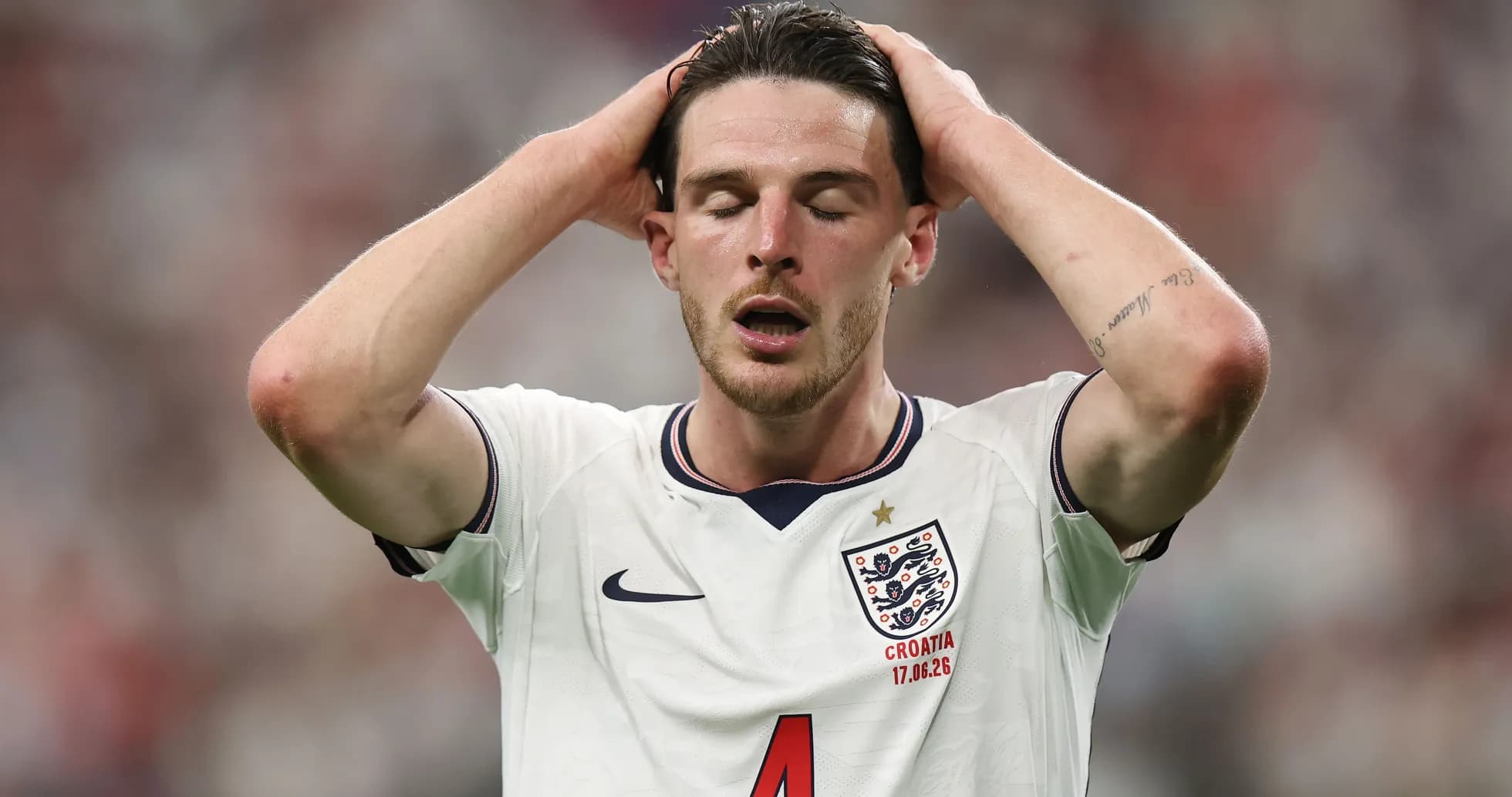 Player holding head in distress during match