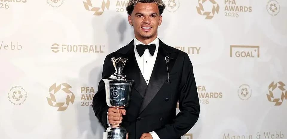 Player holding trophy at PFA Awards ceremony