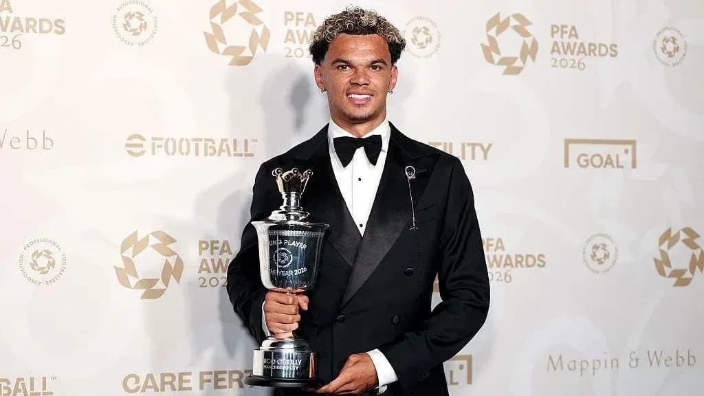 Player holding trophy at PFA Awards ceremony