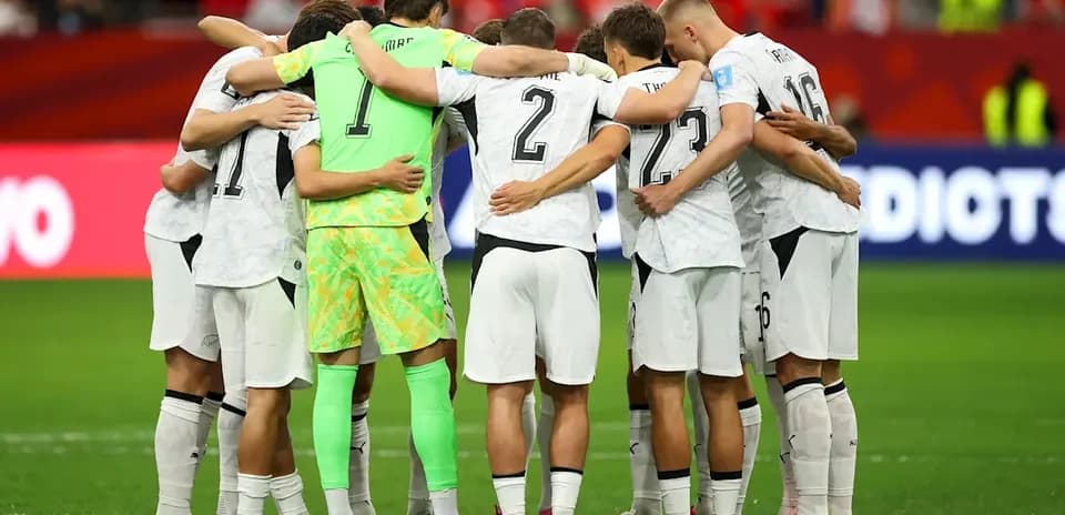 Team huddle before match in stadium