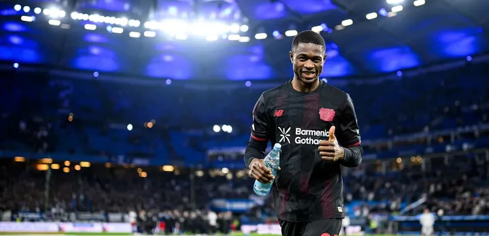 Player celebrating with water bottle after match
