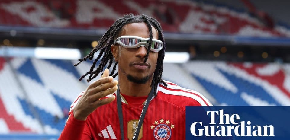 Player gesturing on the pitch in Bayern Munich kit
