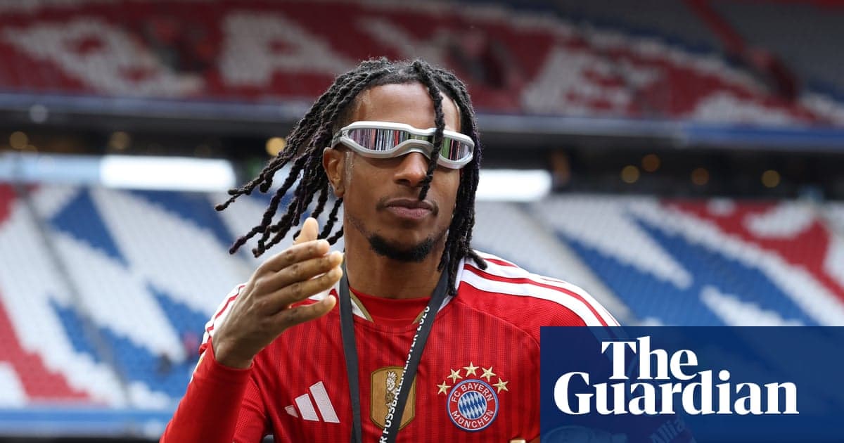 Player gesturing on the pitch in Bayern Munich kit