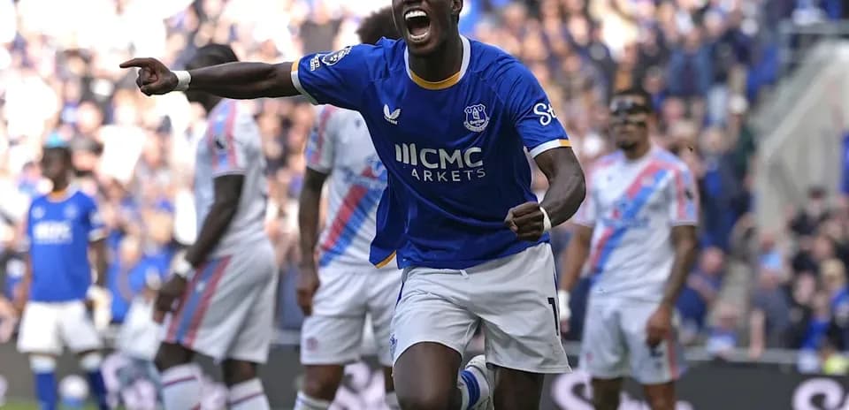 Player celebrating a goal for Everton during match