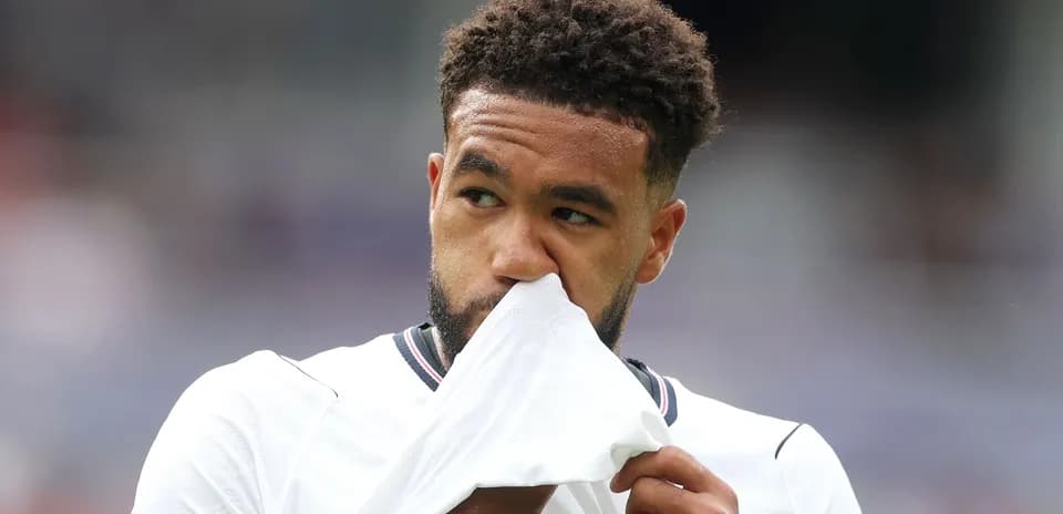 Player wiping his nose with jersey during match