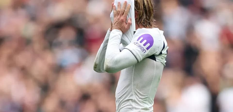 Player removing shirt in frustration during match