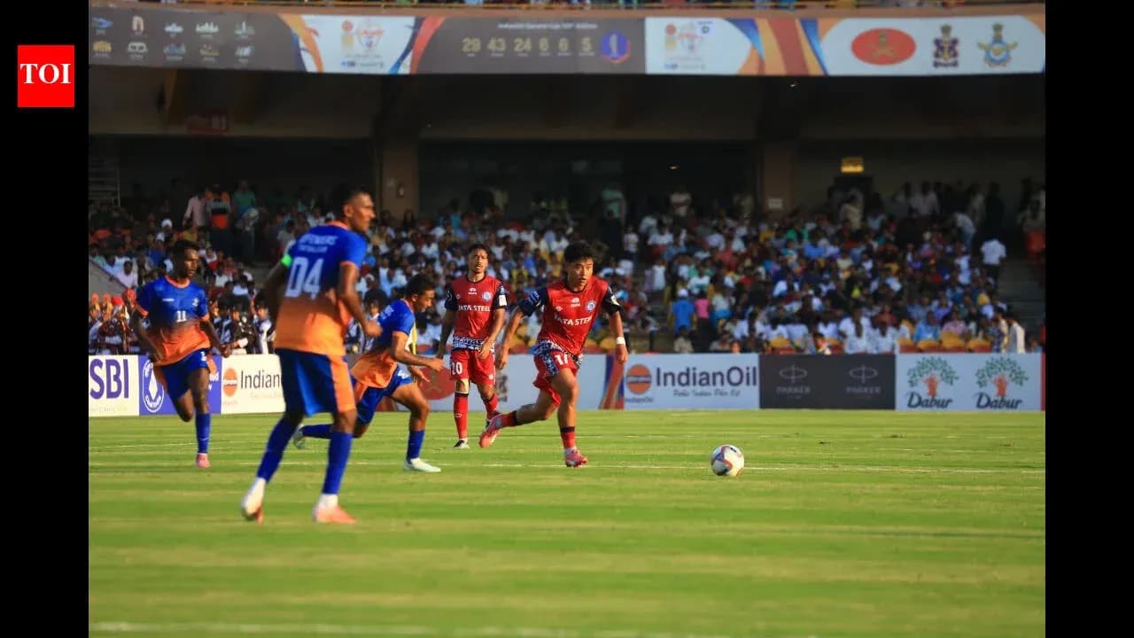 Players competing for the ball during a football match