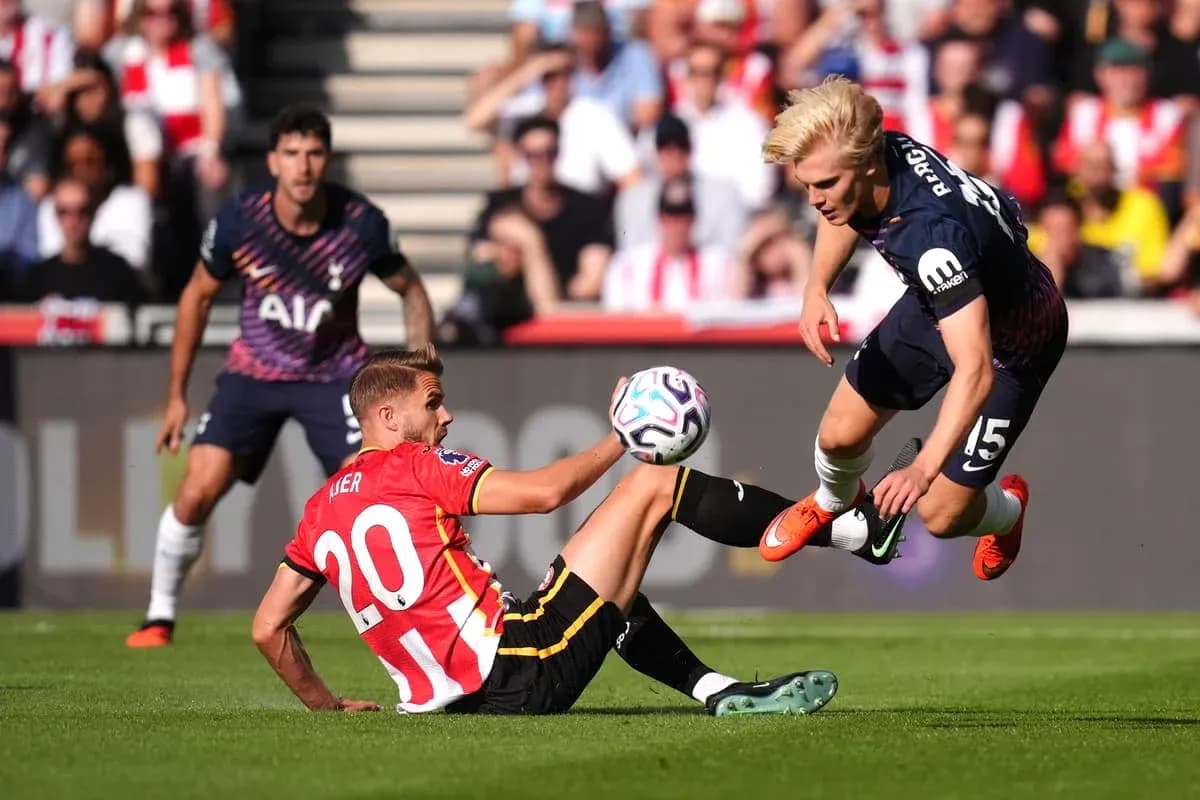 Player tackling opponent during a football match