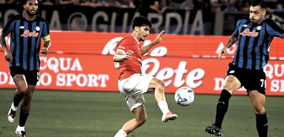 Player attempting to kick the ball during match