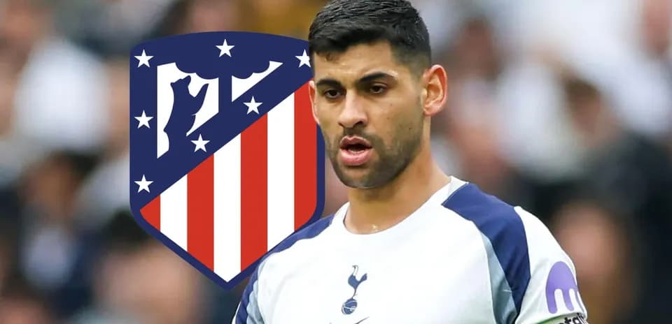Player in Tottenham kit with Atletico Madrid logo behind