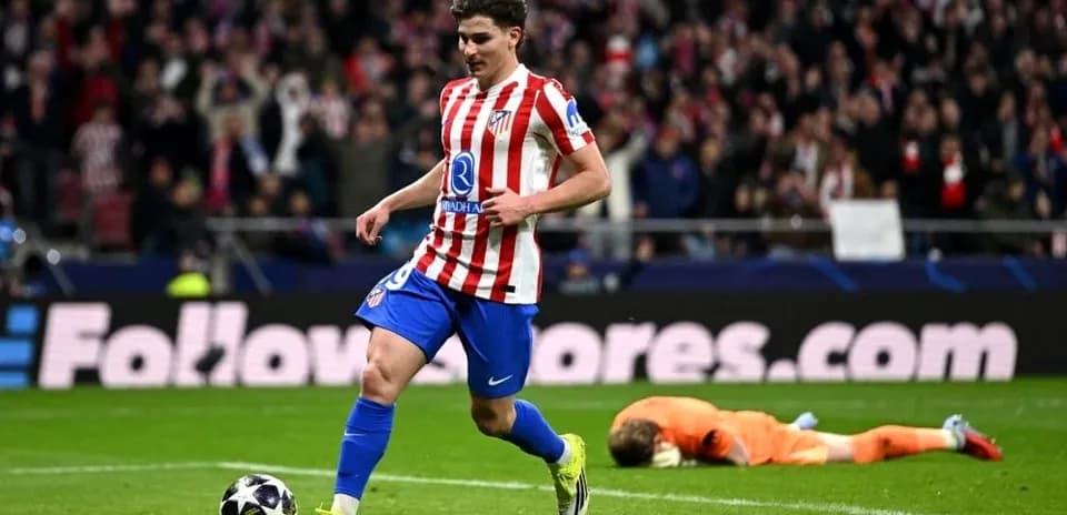 Atletico Madrid player celebrating after scoring goal