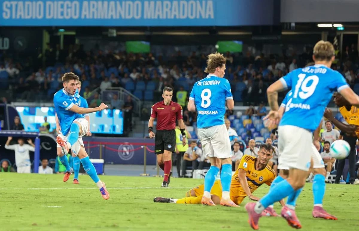 Napoli player shooting on goal during match