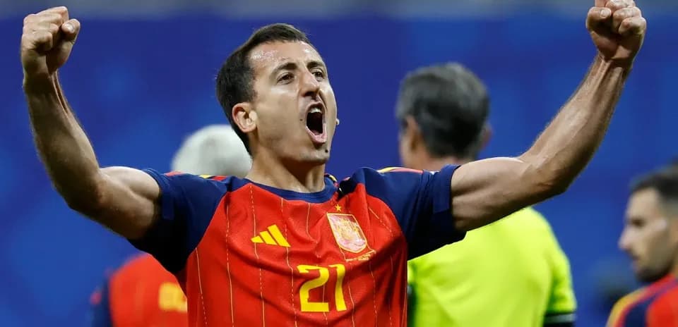 Player celebrating victory in Spain national jersey