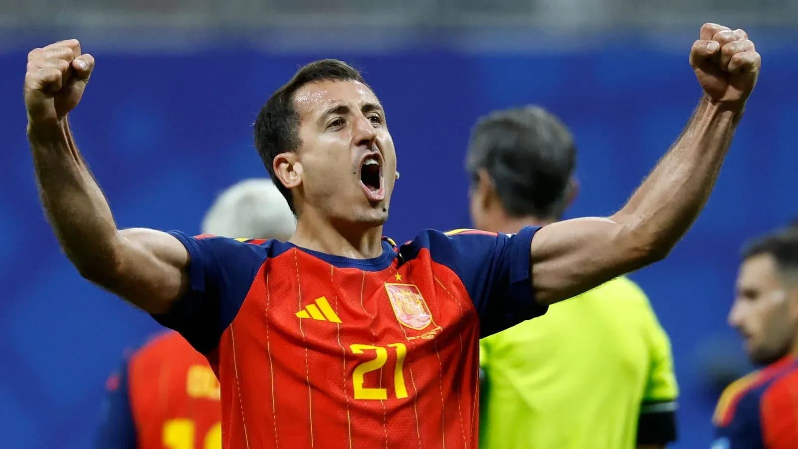 Player celebrating victory in Spain national jersey