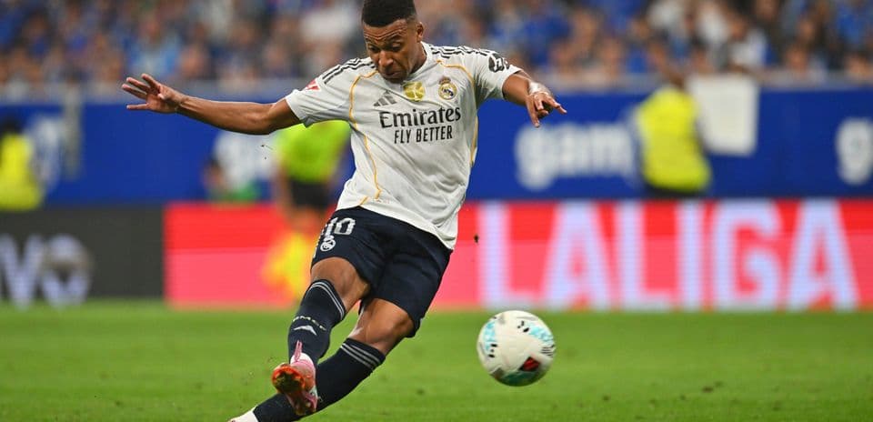 Player kicking the ball during Real Madrid match