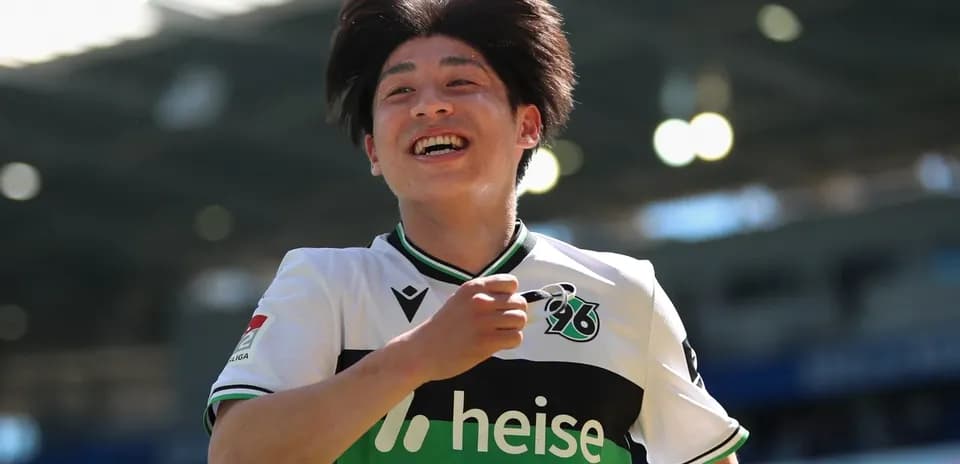 Player celebrating after scoring a goal during match