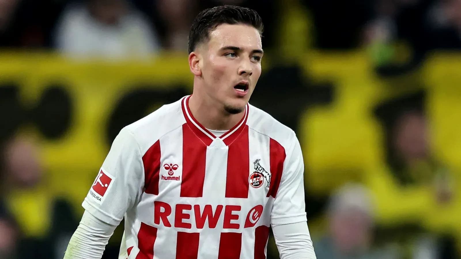 Player in FC Köln jersey during match action