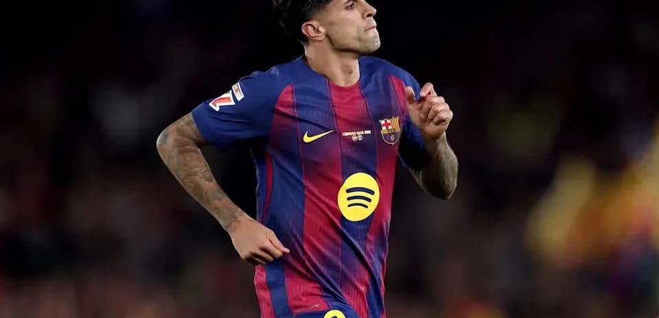 Player running in FC Barcelona kit during match