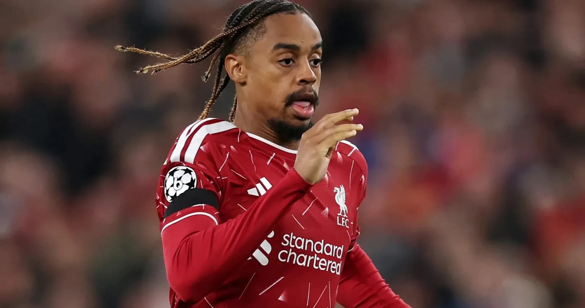 Player in Liverpool kit running on the pitch