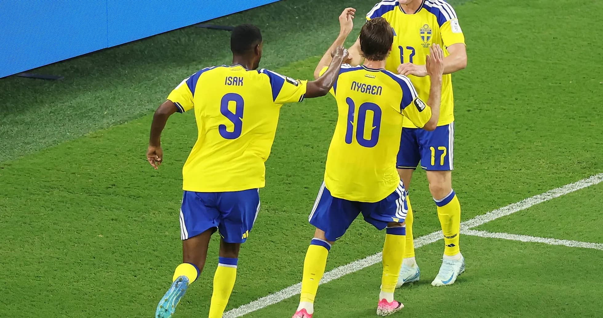 Sweden players celebrating a goal during match